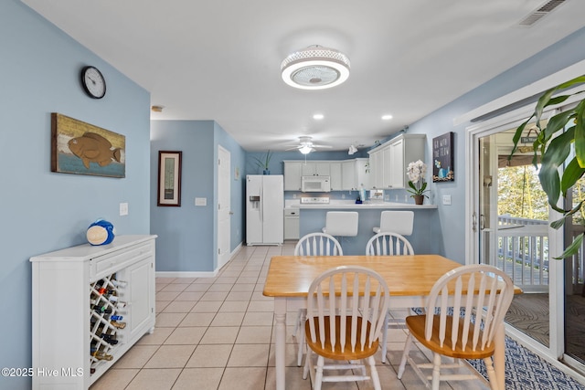 dining room featuring recessed lighting, baseboards, light tile patterned flooring, visible vents, and a ceiling fan