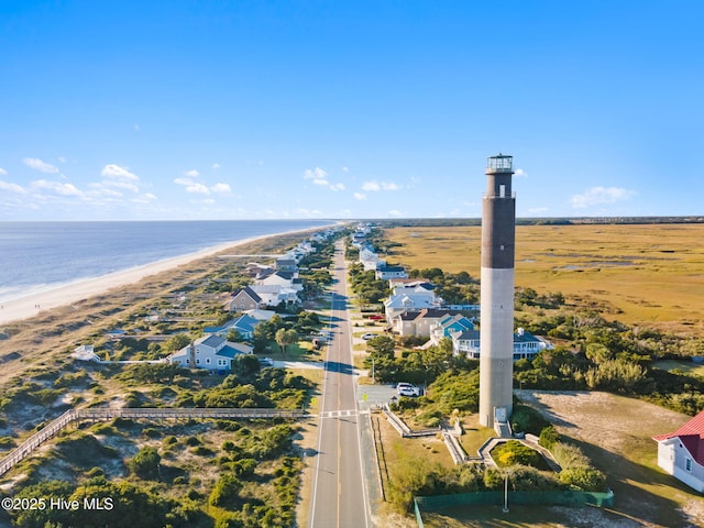 aerial view with a beach view and a water view