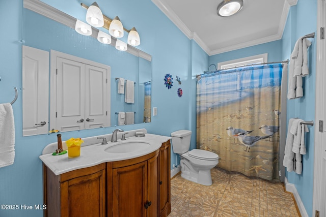 bathroom featuring crown molding, baseboards, toilet, a shower with shower curtain, and vanity