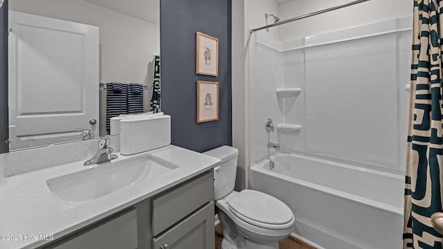 bathroom with toilet, vanity, and shower / bath combination with curtain