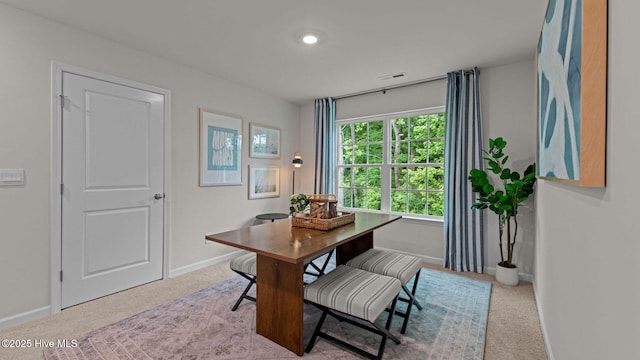 office featuring visible vents, baseboards, and carpet floors