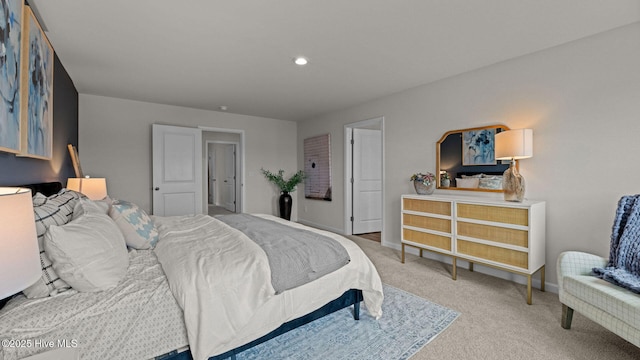 carpeted bedroom with recessed lighting and baseboards