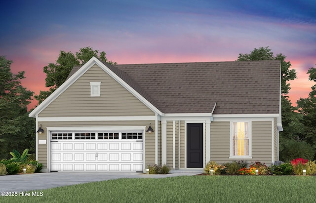 new england style home featuring a garage, concrete driveway, a front yard, and a shingled roof