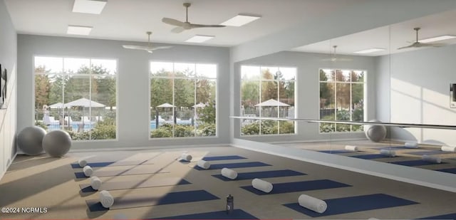 workout room featuring ceiling fan