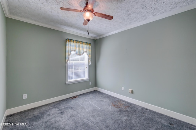 empty room with visible vents, baseboards, carpet flooring, a textured ceiling, and a ceiling fan