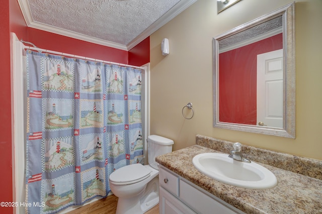 bathroom with a shower with curtain, toilet, a textured ceiling, crown molding, and vanity