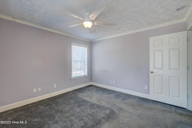 empty room featuring baseboards, carpet floors, a textured ceiling, and ornamental molding