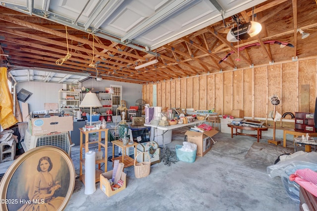 garage featuring a garage door opener