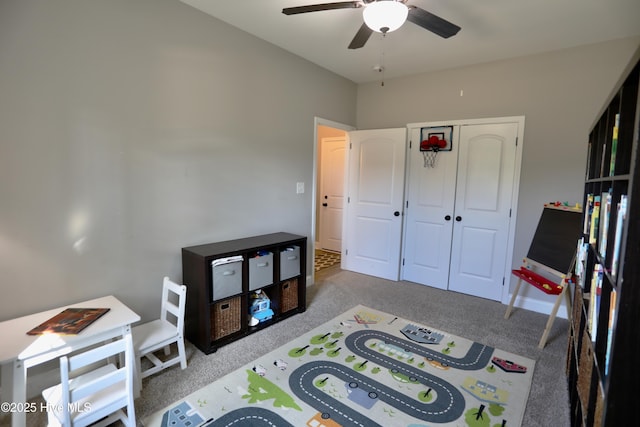 bedroom featuring ceiling fan, baseboards, and carpet