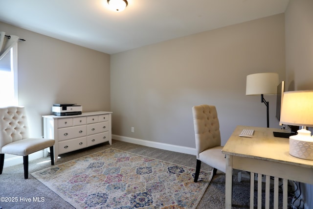 office with baseboards and carpet