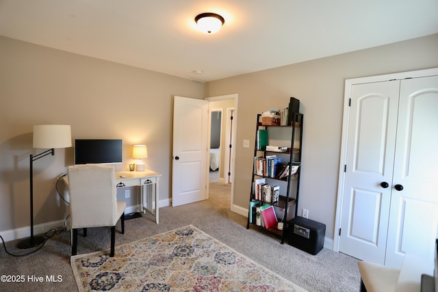 home office featuring baseboards and carpet flooring