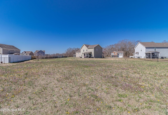 view of yard featuring fence