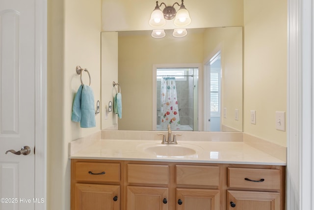 bathroom with vanity and a shower with shower curtain