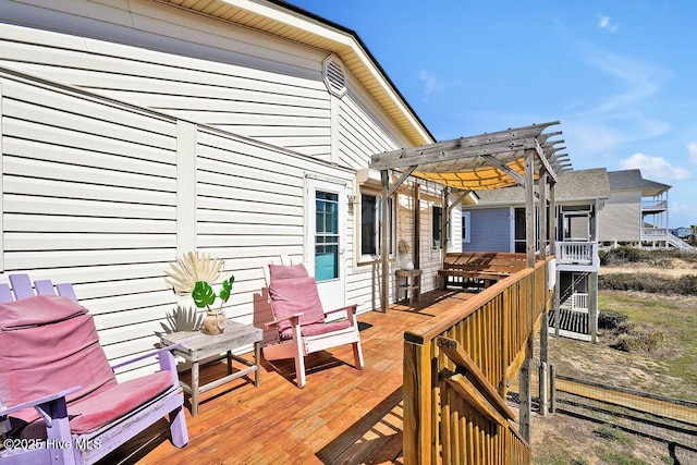 wooden terrace featuring a pergola