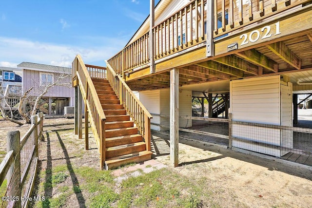 exterior space with stairway and central AC