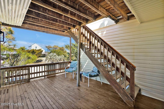 wooden deck featuring stairway