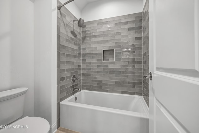 full bath featuring bathing tub / shower combination and toilet