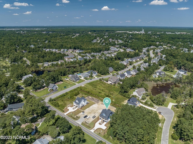 bird's eye view with a view of trees