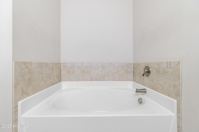 bathroom featuring a garden tub