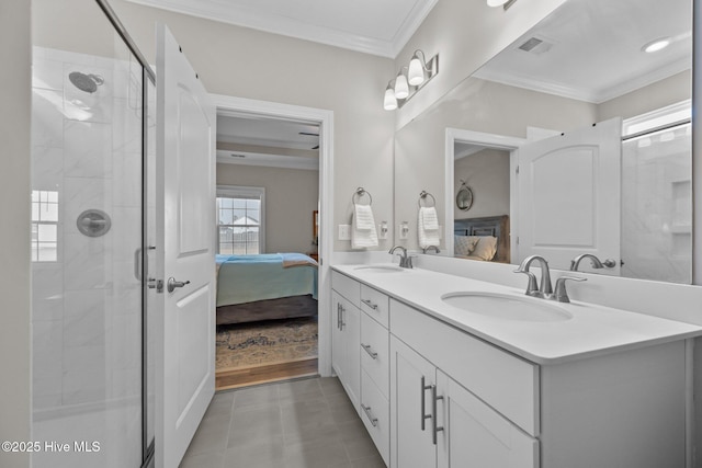 full bathroom with ensuite bath, ornamental molding, a shower stall, and a sink