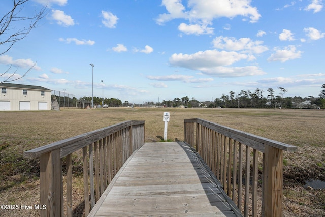 view of home's community featuring a yard