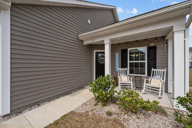 entrance to property with covered porch