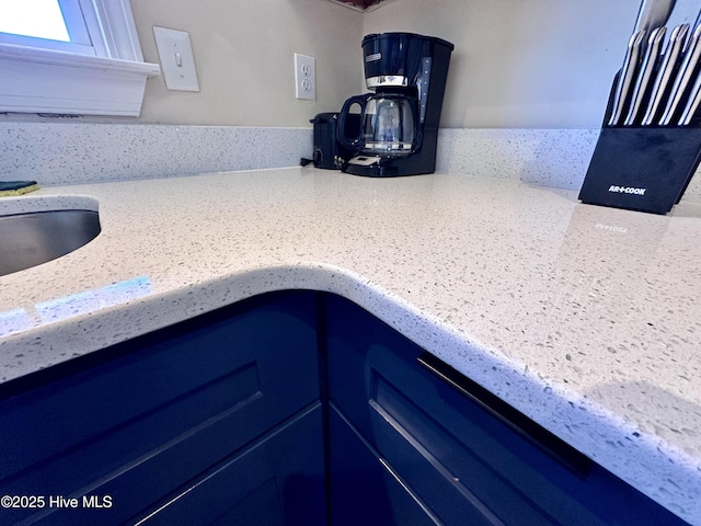 details with light stone countertops