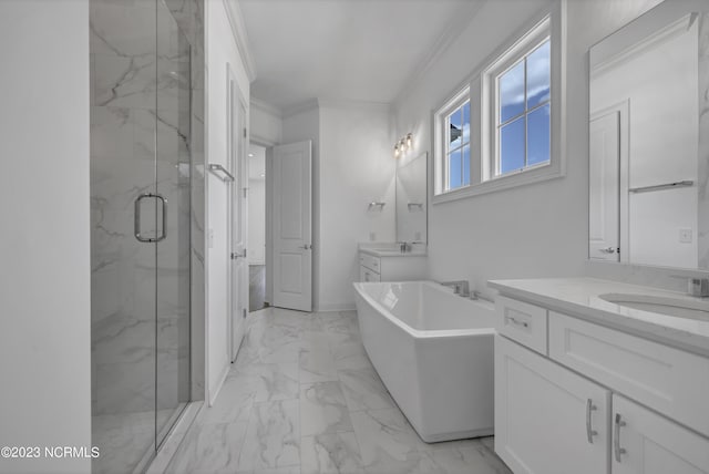 full bath with a marble finish shower, a soaking tub, a sink, crown molding, and marble finish floor