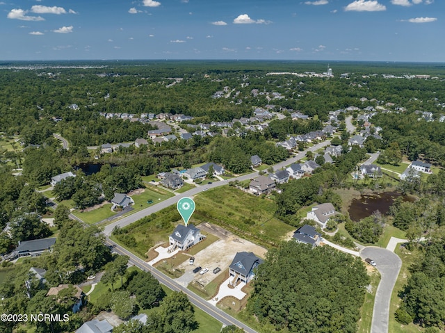 aerial view featuring a view of trees