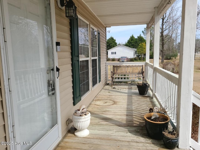 wooden deck with a porch