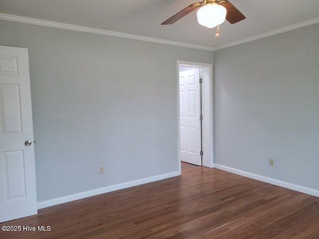 spare room featuring baseboards, wood finished floors, a ceiling fan, and ornamental molding