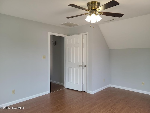 additional living space featuring visible vents, baseboards, wood finished floors, and a ceiling fan