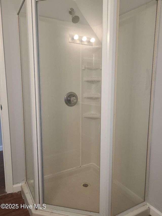 bathroom featuring a stall shower