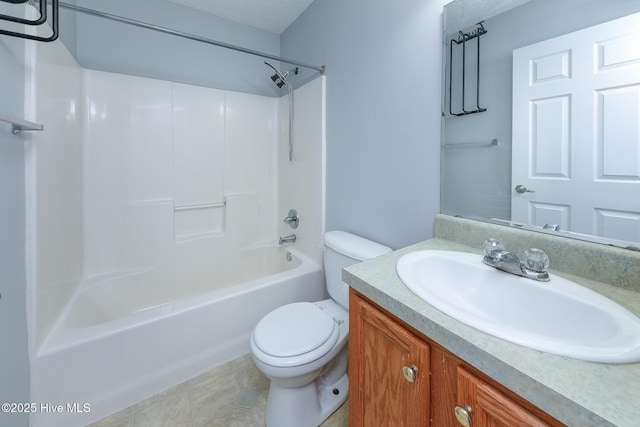 bathroom featuring vanity, a textured ceiling, shower / bath combination, tile patterned floors, and toilet