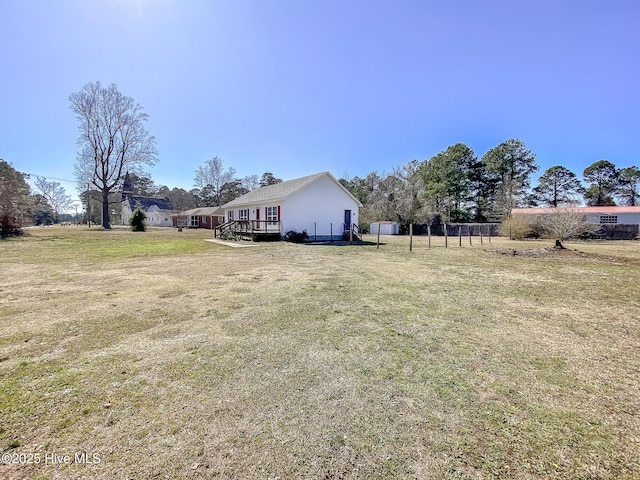 view of yard with a deck