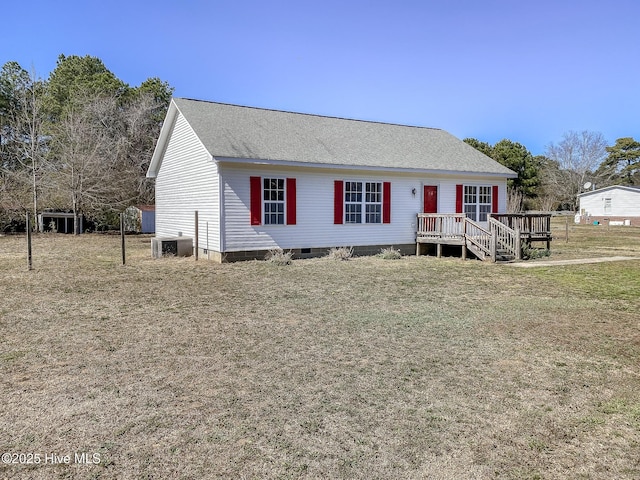 view of front of home with a deck, a front yard, a shingled roof, crawl space, and central AC unit