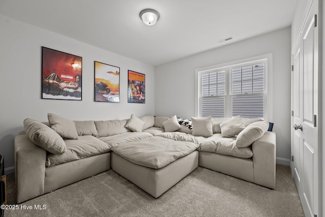 carpeted living room with visible vents