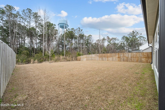 view of yard featuring fence