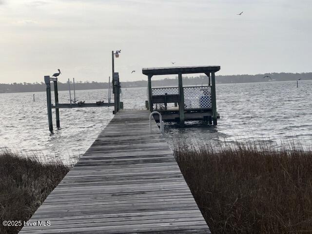 view of dock with a water view