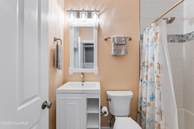 full bathroom featuring vanity, toilet, and shower / tub combo with curtain