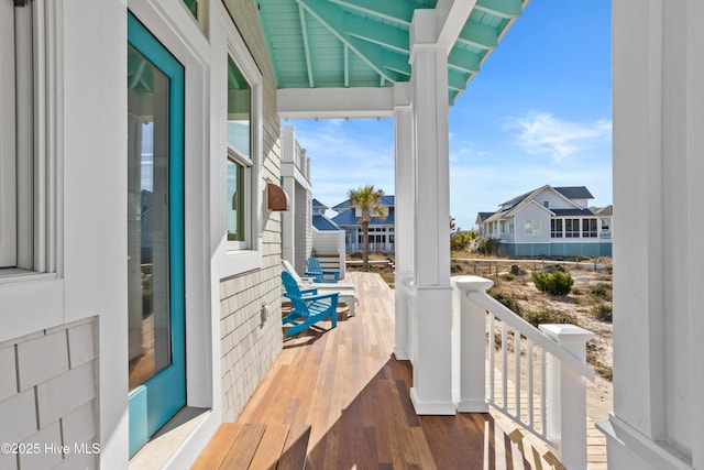 balcony featuring a residential view