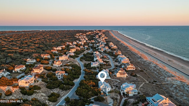 bird's eye view featuring a beach view and a water view