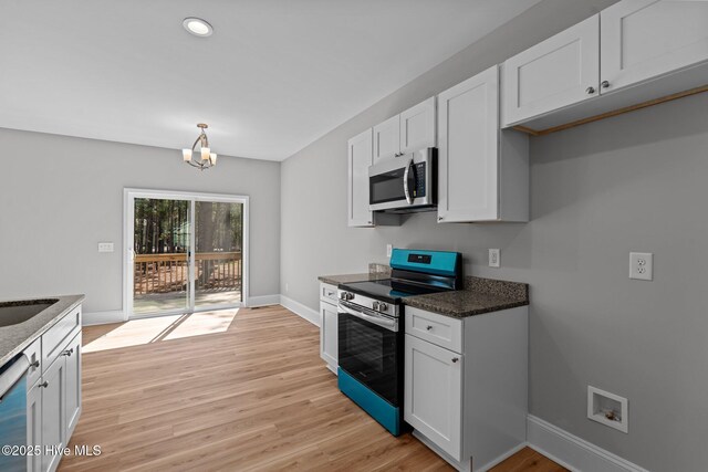 747 Warbler Pl, Vass, NC 28394 - kitchen featuring light wood-type flooring, recessed lighting, stainless steel appliances, white cabinets, and baseboards
