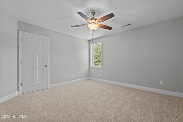 747 Warbler Pl, Vass, NC 28394 - carpeted spare room featuring visible vents, a ceiling fan, and baseboards