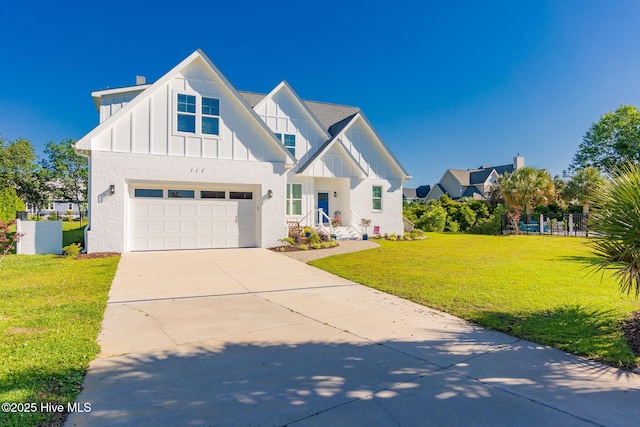 111 E Magens Ct, Cedar Point, NC 28584 - modern inspired farmhouse featuring board and batten siding, a front lawn, concrete driveway, and a garage
