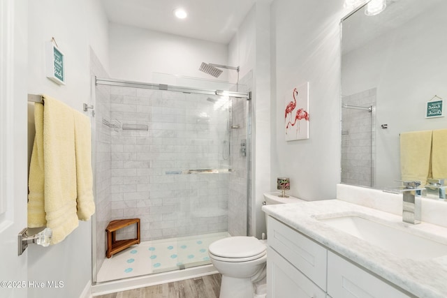 111 E Magens Ct, Cedar Point, NC 28584 - full bathroom with a shower stall, vanity, wood finished floors, and recessed lighting