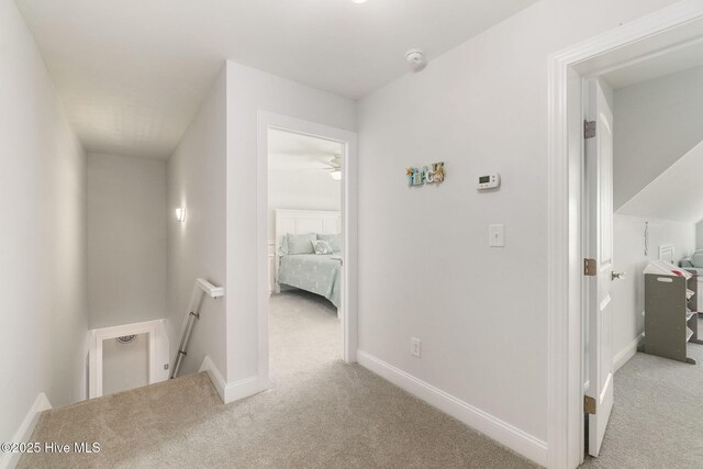 111 E Magens Ct, Cedar Point, NC 28584 - hall with an upstairs landing and carpet floors
