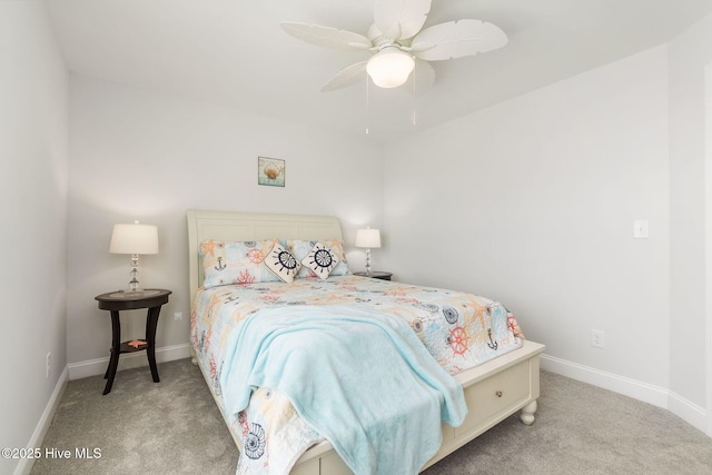 bedroom featuring baseboards, light carpet, and ceiling fan