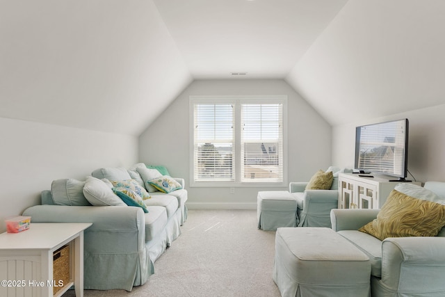 living area with visible vents, light carpet, baseboards, and vaulted ceiling