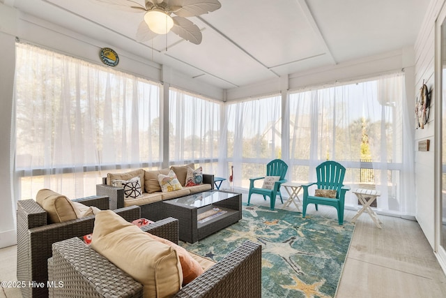 sunroom / solarium with ceiling fan